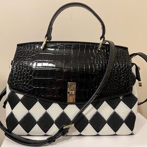 Genuine patent leather handbag. New condition. No brand.